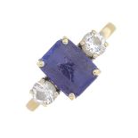 An 18ct gold tanzanite and diamond three-stone ring.Estimated total diamond weight 0.45ct.