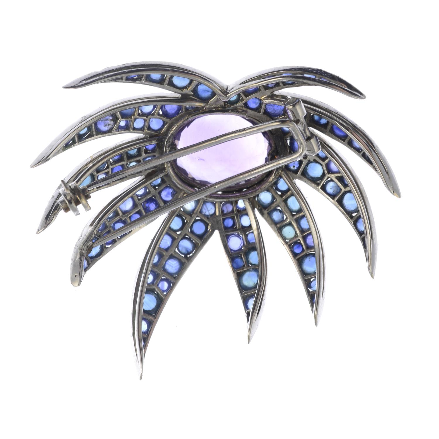 An amethyst and sapphire brooch.One sapphire deficient.Total sapphire weight 13cts. - Image 2 of 2