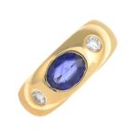 A sapphire and diamond three-stone ring.Sapphire calculated weight 1.95cts,