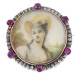 A late Victorian gold ruby and diamond portrait brooch.Diameter 2.8cms.