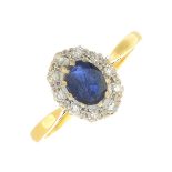 A sapphire and diamond cluster ring.