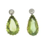 A pair of peridot and old-cut diamond earrings.Peridot calculated total weight 7.73cts,