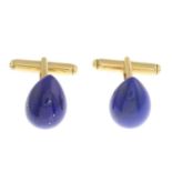 A pair of 18ct gold lapis lazuli cufflinks.Hallmarks for London, 2000.Length 1.6cms.