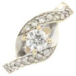 A diamond crossover ring.Estimated total diamond weight 0.75ct.Principal diamond estimated weight