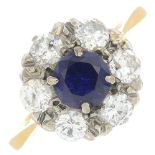 A synthetic sapphire and brilliant-cut diamond cluster ring.Estimated total diamond weight 1ct,