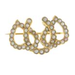 An early 20th century split pearl brooch.