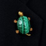 A mid 20th century gold malachite tortoise brooch, with sapphire eyes.Stamped 18K.