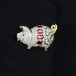 A pave-set diamond and pierced pig brooch,