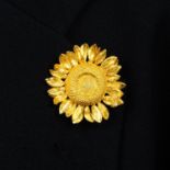 An 18ct gold sunflower brooch, by Asprey.