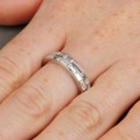 A platinum vari-size baguette-cut diamond two-row full eternity ring.Estimated total diamond weight