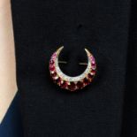 A late Victorian cushion-shape ruby and old-cut diamond crescent brooch.Ruby total calculated