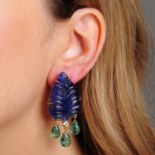 A pair of foliate carved tanzanite earrings,