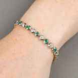 An emerald and brilliant-cut diamond collet line bracelet.