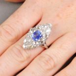 A sapphire and old-cut diamond marquise-shape ring.Sapphire weight 1.30cts.Estimated total diamond