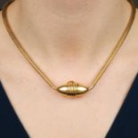 A late Victorian gold ruby-eyed snake locket necklace.Length 38.5cms.