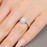 A rectangular-shape and brilliant-cut diamond cluster ring.With report 2191796558,