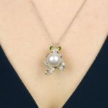 A pave-set diamond frog pendant,