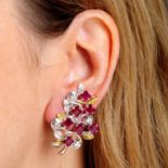 A pair of 18ct bi-colour gold ruby and brilliant-cut diamond foliate earrings.Estimated total