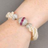 A natural pearl multi-strand bracelet, with circular-shape ruby and pave-set diamond clasp.