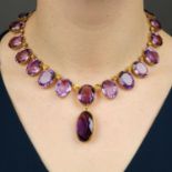 A late Victorian gold amethyst necklace,