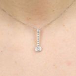A brilliant-cut diamond cluster drop pendant,