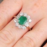 An emerald and vari-cut diamond cluster ring.