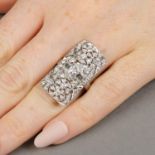 A vari-cut diamond geometric floral cluster ring.