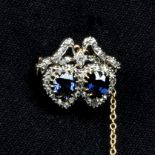 A late Victorian silver and gold, blue spinel and rose-cut diamond double heart brooch.