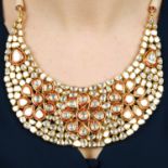 A foil-back diamond and enamel cluster necklace, with woven cord and bead back-chain.