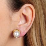 A pair of cultured pearl and diamond earrings,