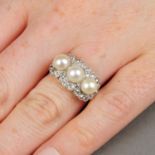 An early 20th century 18ct gold and platinum, pearl and old-cut diamond triple cluster ring.