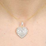 A pave-set diamond heart pendant, with chain.