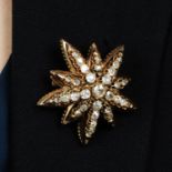 A late Victorian 9ct gold, old and rose-cut diamond star brooch.