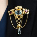 A mid 19th century 18ct gold aquamarine and garnet brooch.Principal aquamarine calculated weight