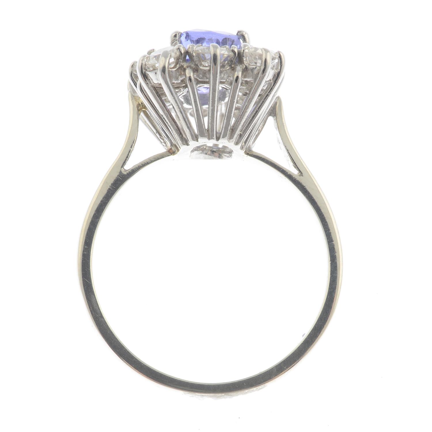 A sapphire and diamond cluster ring. - Image 4 of 6