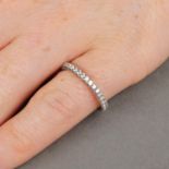 An 18ct gold diamond 'Etincelle' full eternity ring,