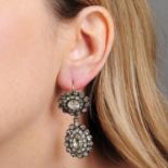 A pair of Georgian silver circular and pear-shape paste cluster drop earrings.