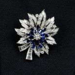 A mid 20th century platinum sapphire and diamond floral cluster brooch.Estimated total diamond