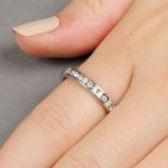 An 18ct gold brilliant-cut diamond full eternity ring.