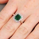 A rectangular-shape emerald and brilliant-cut diamond cluster ring.