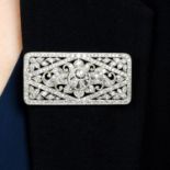 An Art Deco platinum, old and single-cut diamond floral brooch.