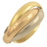 A 'Trinity' ring, by Cartier.Signed Cartier, DD9974.Stamped 750.Ring size J.