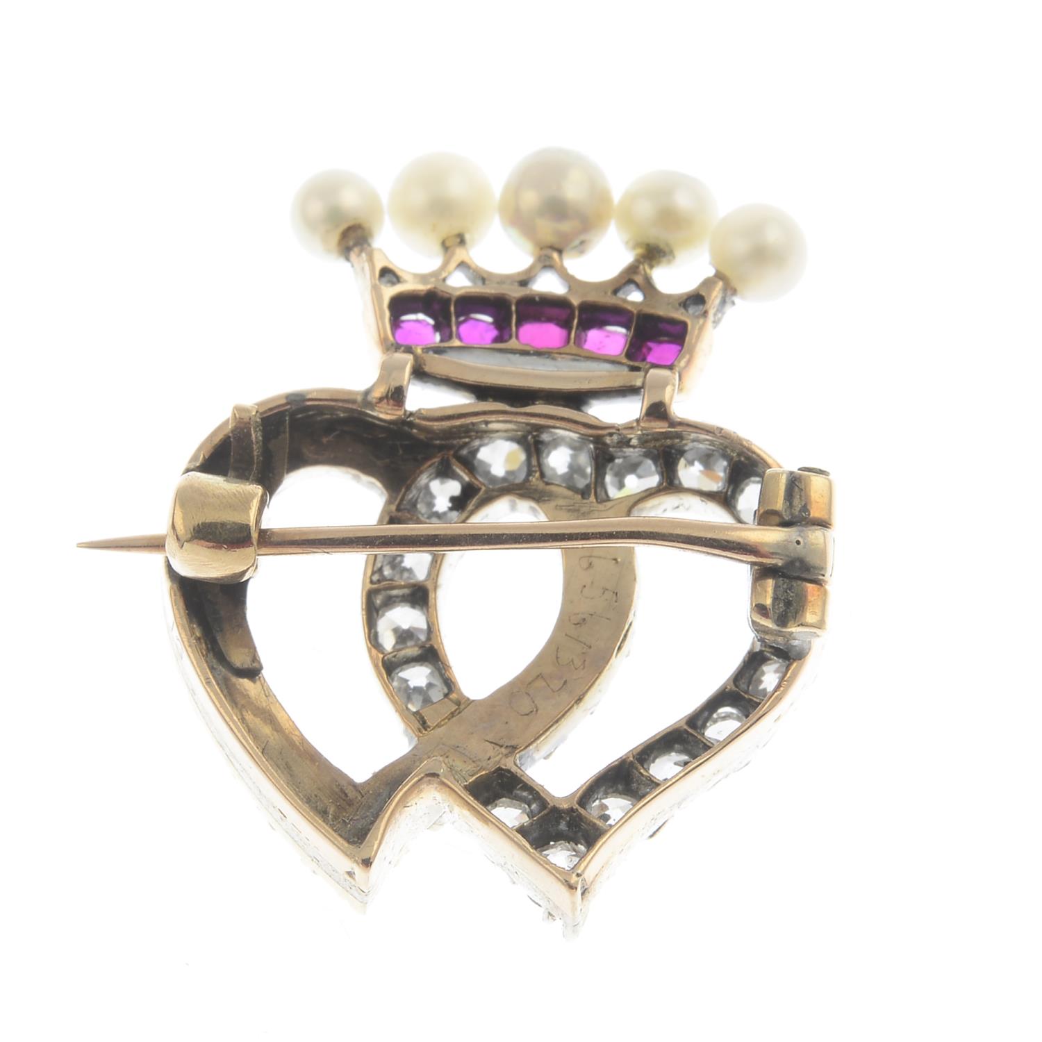 A ruby, diamond and cultured pearl brooch.Estimated total diamond weight 0.50ct.Length 2.4cms. - Image 2 of 3