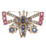 A sapphire, ruby and diamond butterfly brooch.Length 4cms.