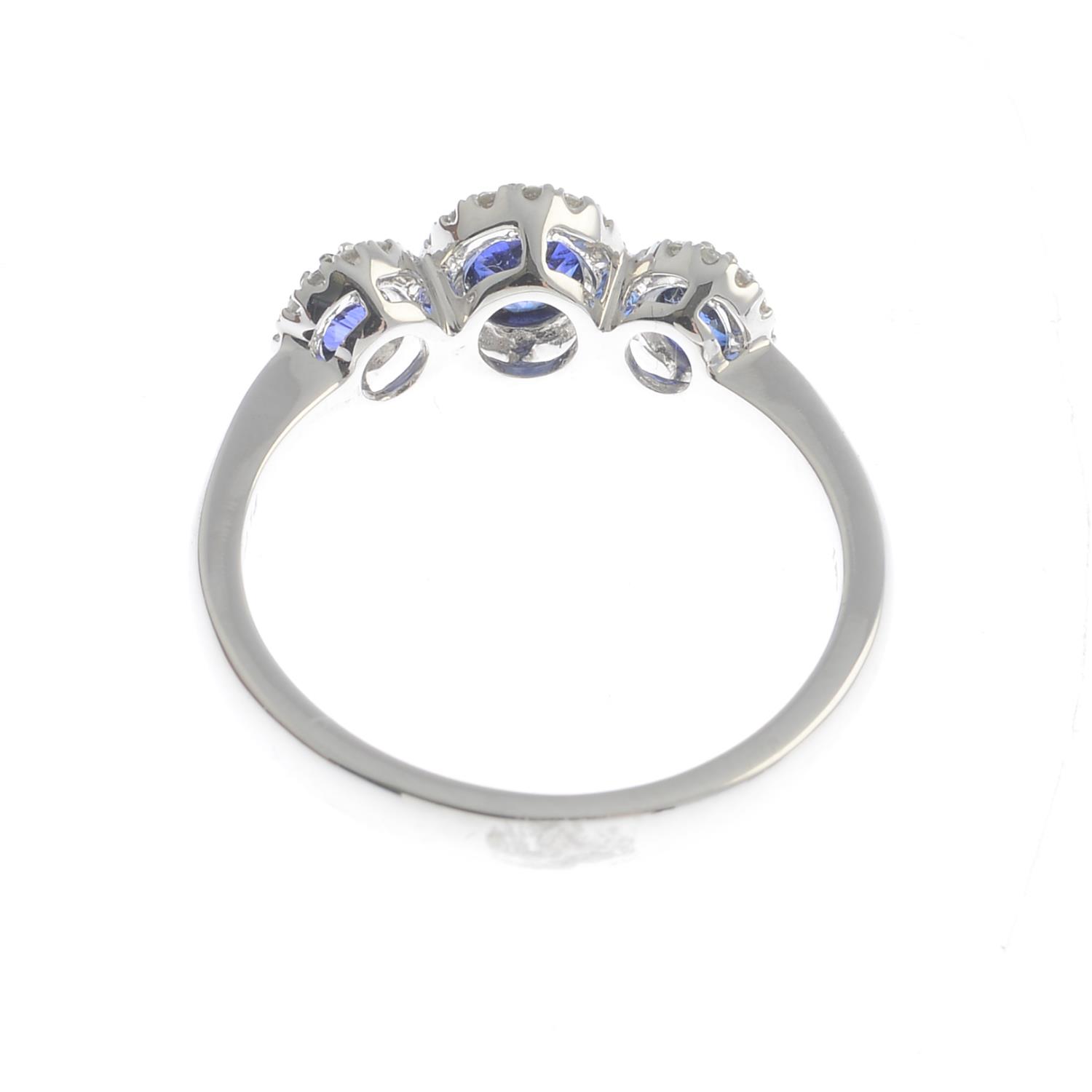 A sapphire and diamond dress ring.Total sapphire weight 0.84ct, - Image 2 of 3