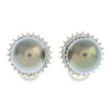A pair of cultured pearl and diamond cluster earrings.Estimated dimensions of cultured pearl 11.7