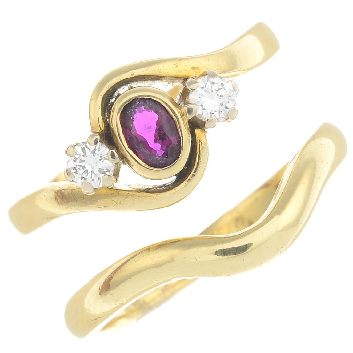 An 18ct gold ruby and diamond three-stone ring,