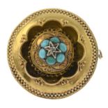 A late 19th century gold turquoise brooch.Diameter 3.5cms.