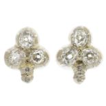 A pair of diamond cluster earrings.Estimated total diamond weight 1.20cts,
