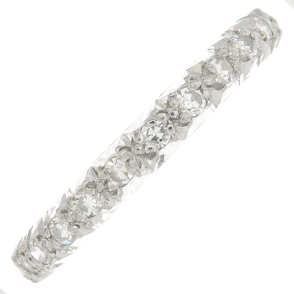 A diamond full eternity ring.Estimated total diamond weight 1ct.Ring size O.